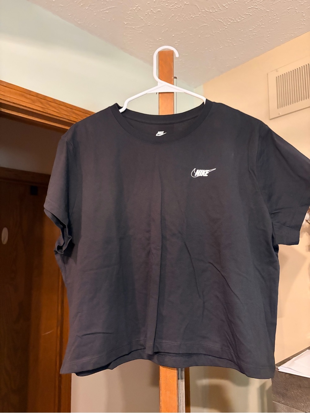Two “The Nike Tee” Crop T-Shirt